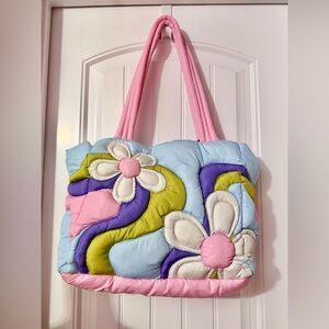 Delia’s Daisy Puffer Tote Bag by Dolls Kill